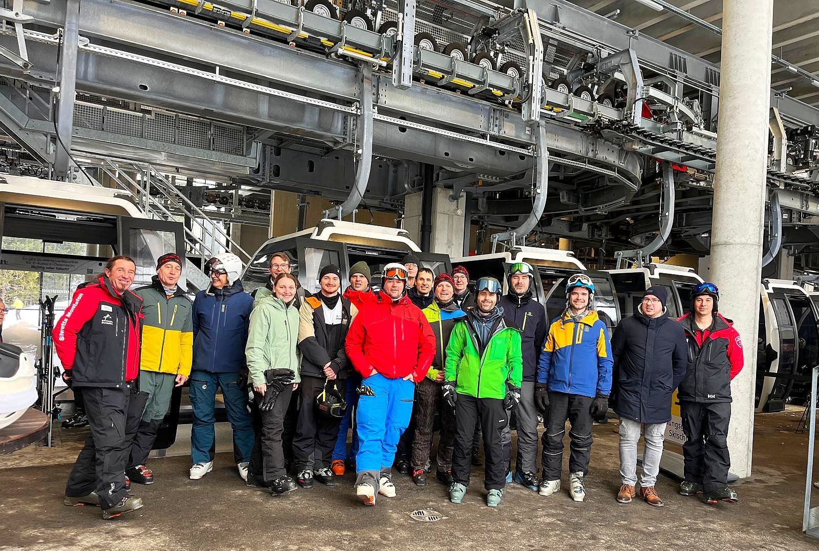 ROTEC team in front of a cable car station in the Silvretta Arena Montafon