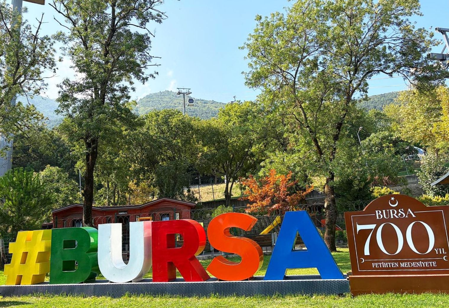 "Bursa" lettering with the cable car station in the background